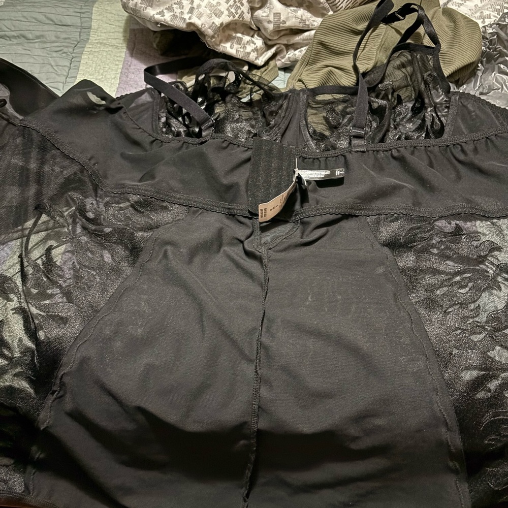 Size 6 torrid bodysuit brand new never worn still has tags on it